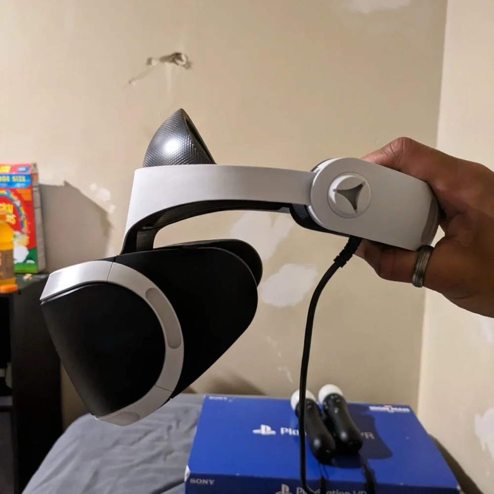 hardly used VR with the two controllers and all the cords with Spider-Man VR